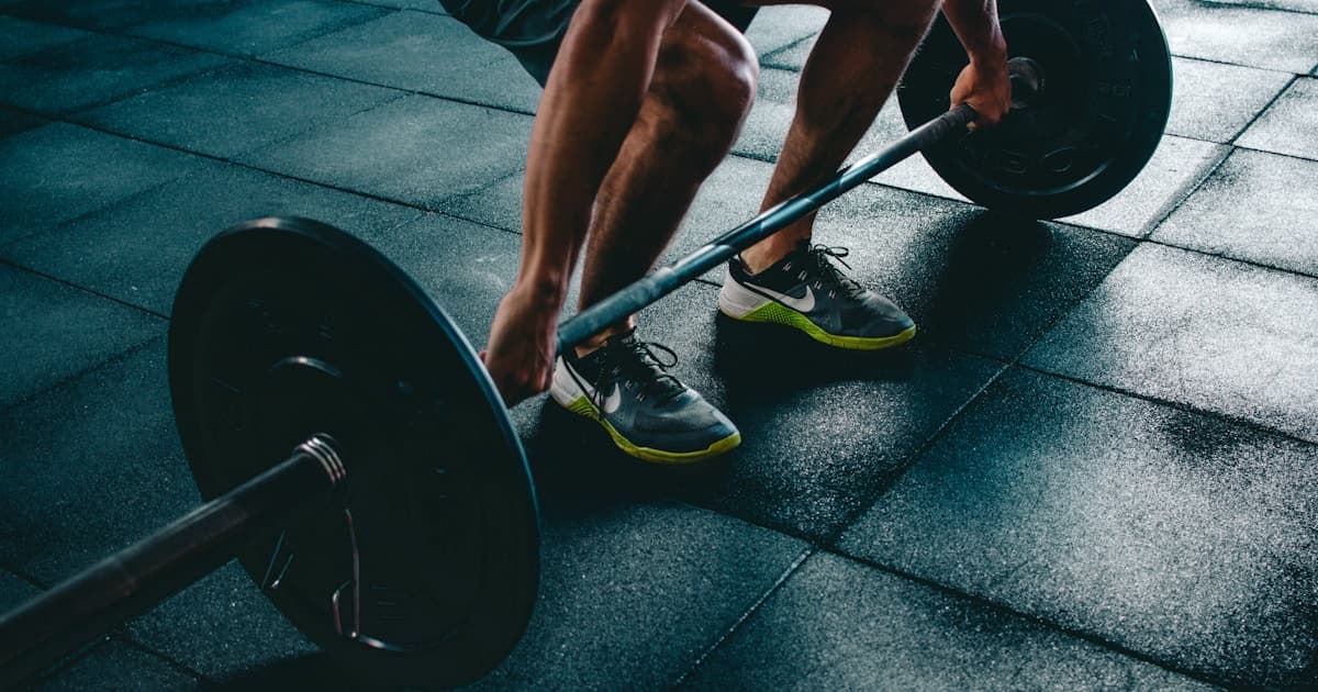 Well-equipped gym with free weights and training stations