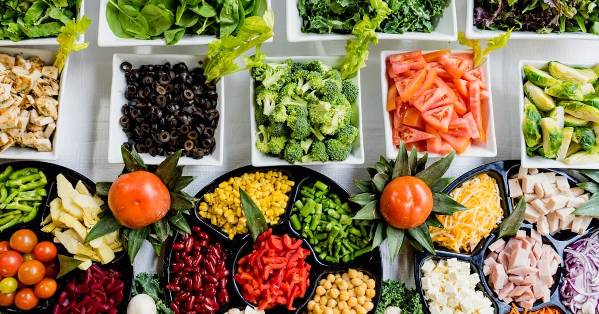 Fresh vegetables and whole foods arranged for a balanced nutrition plan
